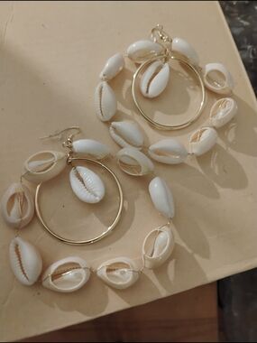 Gold Hoop Earrings with White Cowrie Shells accent